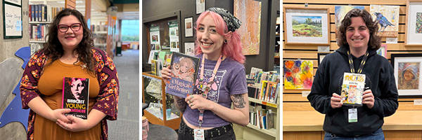 Library staff holding books.